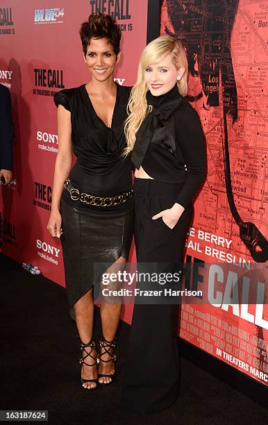 Actress Halle Berry and actress Abigail Breslin arrive at the premiere Of Tri Star Pictures' "The Call" at ArcLight Cinemas on March 5, 2013 in...