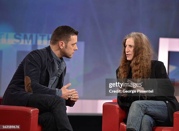 George Stroumboulopoulos interviews Patti Smith on 'George Stroumboulopoulos Tonight' at CBC Broadcast Centre on March 5, 2013 in Toronto, Canada.