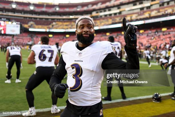 Odell Beckham Jr. #3 of the Baltimore Ravens reacts to a fan in the stands prior to an NFL preseason game between the Washington Commanders and the...