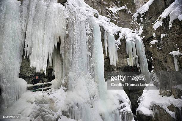 Visitors looks at the winter ice in the Breitachklamm Canyon at Tiefenbach near Oberstorf on March 5, 2013 in Oberstdorf, Germany. The remarkable...