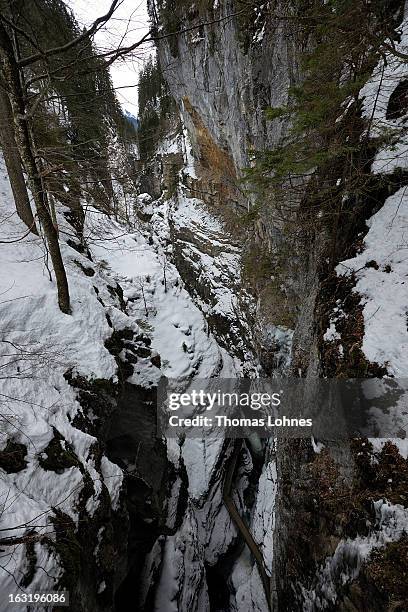 Visitors walk over a bridge in the Breitachklamm Canyon at Tiefenbach near Oberstorf on March 5, 2013 in Oberstdorf, Germany. The remarkable nature...