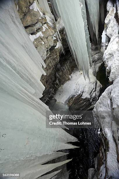 Water surrounds the ice covered rocks and stones in the Breitachklamm Canyon at Tiefenbach near Oberstorf on March 5, 2013 in Oberstdorf, Germany....