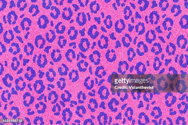 animal print pattern on pink glitter backgrond - leopard print texture stock pictures, royalty-free photos & images