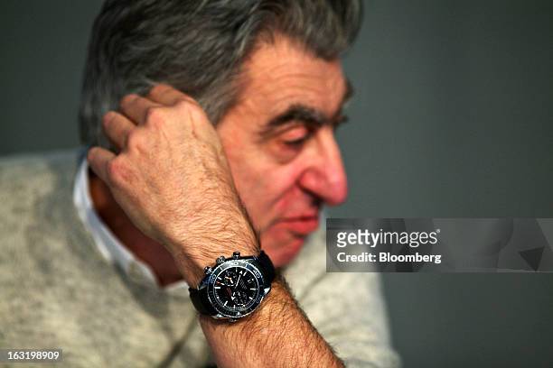 Nick Hayek, chief executive officer of Swatch AG, wears an Omega Seamaster Professional wristwatch during the company's annual results news...