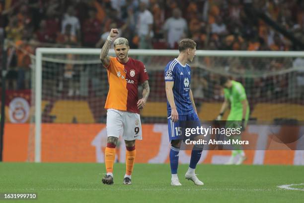 Mauro Icardi of Galatasaray celebrates after scoring his team's first goal during the UEFA Champions League play-offs second leg match between...