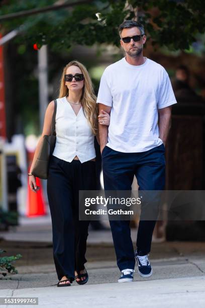 Jennifer Lawrence and Cooke Maroney are seen in the Upper West Side on August 22, 2023 in New York City.