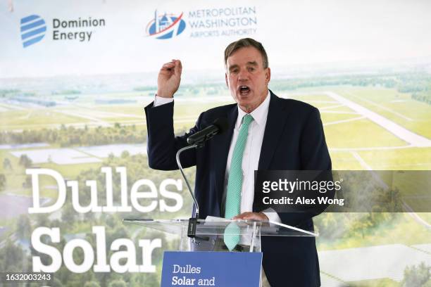 Sen. Mark Warner speaks during an event to break ground on the Dulles Solar and Storage project on August 22, 2023 at Dulles International Airport in...