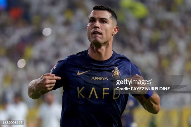 Nassr's Portuguese forward Cristiano Ronaldo celebrates his second goal during the Saudi Pro League football match between Al-Nassr and Al-Shabab in...
