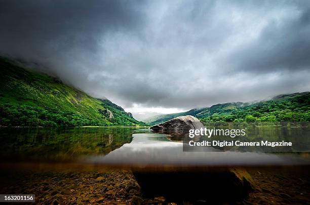 Half-submerged view of a lake in Snowdonia National Park in North Wales, taken on July 9, 2012.