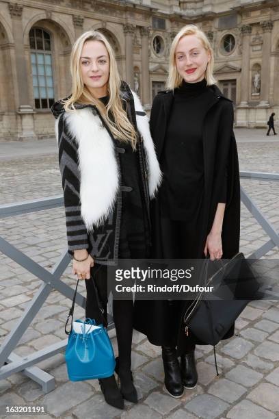 Sisters Claire Courtin-Clarins and Virginie Courtin-Clarins arrive to attend the Louis Vuitton Fall/Winter 2013 Ready-to-Wear show as part of Paris...
