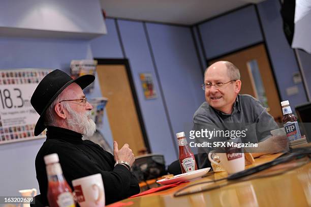 British fantasy/science fiction authors Sir Terry Pratchett and Stephen Baxter during a meeting with SFX Magazine/Future via Getty Images to promote...