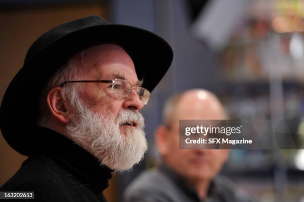 British fantasy/science fiction authors Sir Terry Pratchett and Stephen Baxter during a meeting with SFX Magazine/Future via Getty Images to promote...