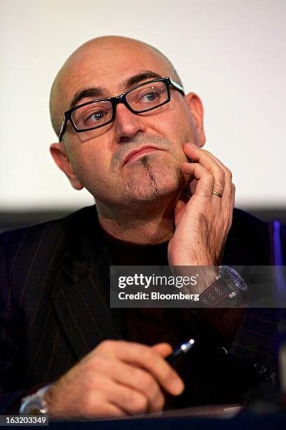 Marc Hayek, head of Swatch Group AG's Blancpain brand, gestures during the company's annual results news conference in Grenchen, Switzerland, on...