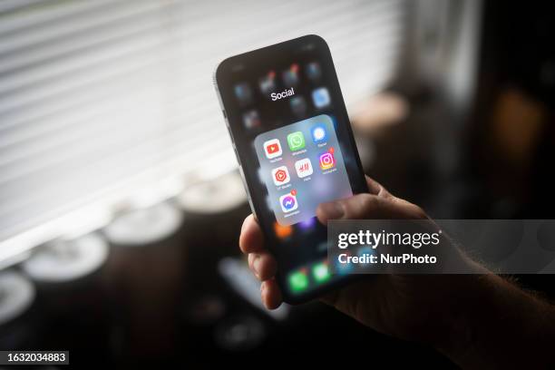 Social media and video applications are seen displayed on an iPhone in this illustration photo in Warsaw, Poland on 29 August, 2023.