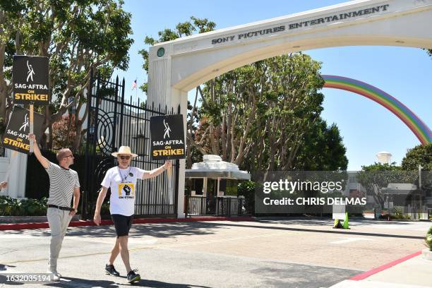 Actors Bryan Cranston and Aaron Paul join the Screen Actors Guild picket line in front of Sony Pictures Entertainment Studios in Culver City,...