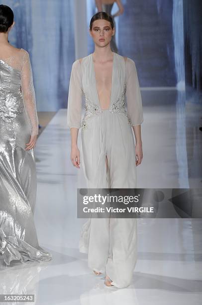 Model walks the runway during the Valentin Yudashkin Fall/Winter 2013 Ready-to-Wear show as part of Paris Fashion Week at Hotel Westin on March 4,...