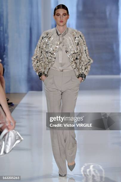 Model walks the runway during the Valentin Yudashkin Fall/Winter 2013 Ready-to-Wear show as part of Paris Fashion Week at Hotel Westin on March 4,...