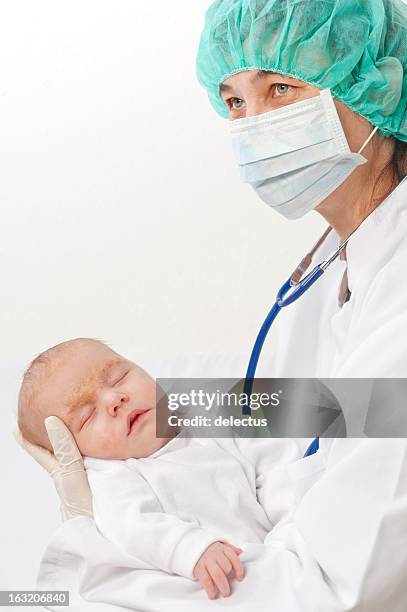 baby with eczema at the doctor - seborrheic dermatitis stock pictures, royalty-free photos & images