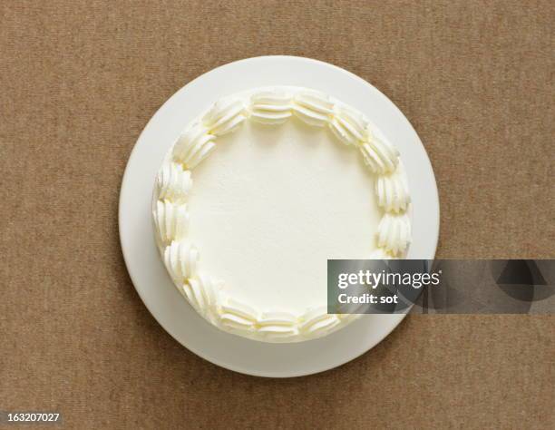 white cake decorated whipped cream,aerial view - schlagsahne stock-fotos und bilder