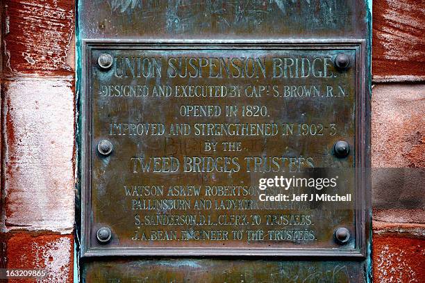 Plaque on the wall next to the Union Bridge on the River Tweed on March 6, 2013 in Berwick Upon Tweed, England. The bridge was built in 1820 and is...