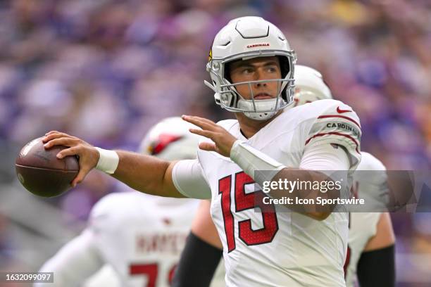 Arizona Cardinals Quarterback Clayton Tune throws a pass to stay loose during a pre-season NFL game between the Minnesota Vikings and Arizona...