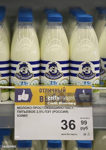 Ruble sign indicates the price of milk inside a Lenta LLC supermarket in Prokopyevsk, Kemerevo region, Russia, on Wednesday, March 6, 2013. Lenta...