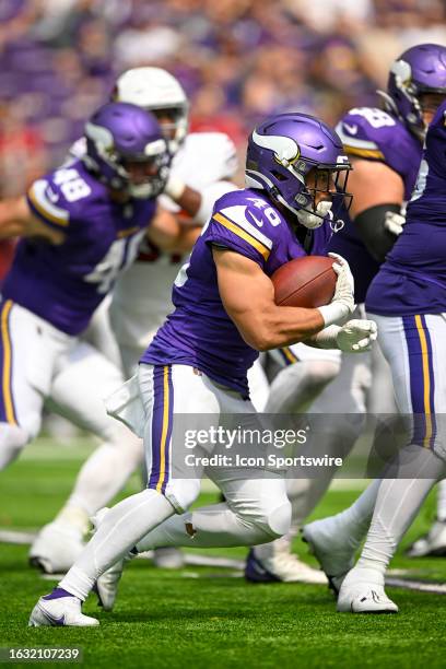 Minnesota Vikings Running back Aaron Dykes runs with the ball during a pre-season NFL game between the Minnesota Vikings and Arizona Cardinals on...