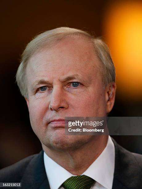 Robert "Bob" Dudley, chief executive officer of BP Plc., listens during an interview at the 2013 IHS CERAWeek conference in Houston, Texas, U.S., on...