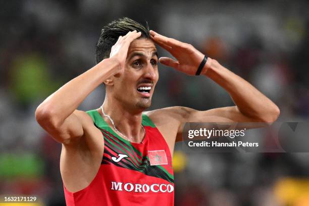 Soufiane El Bakkali of Team Morocco celebrates winning gold in the Men's 3000m Steeplechase Final during day four of the World Athletics...