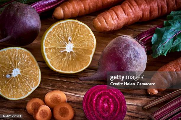 assorted fresh vegetables and fruits in  wooden crate. - vegetales stock pictures, royalty-free photos & images