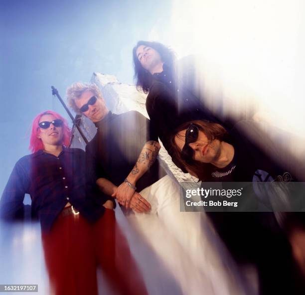 American musicians Brian Young, Joe Skyward , Jon Auer and Ken Stringfellow, of the American power pop group The Posies, pose for a group portrait in...