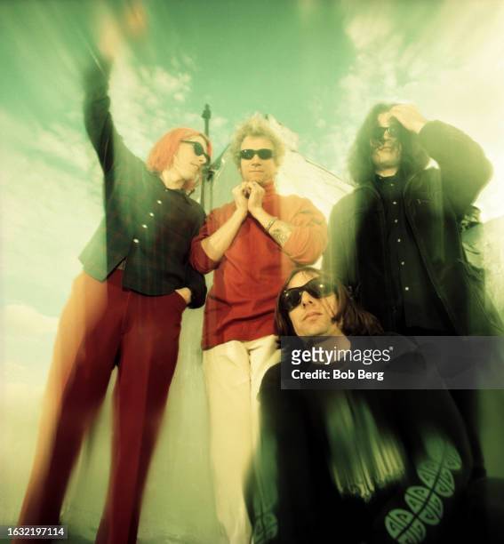 American musicians Brian Young, Joe Skyward , Ken Stringfellow and Jon Auer, of the American power pop group The Posies, pose for a group portrait in...