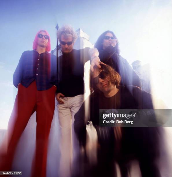 American musicians Brian Young, Joe Skyward , Jon Auer and Ken Stringfellow, of the American power pop group The Posies, pose for a group portrait in...