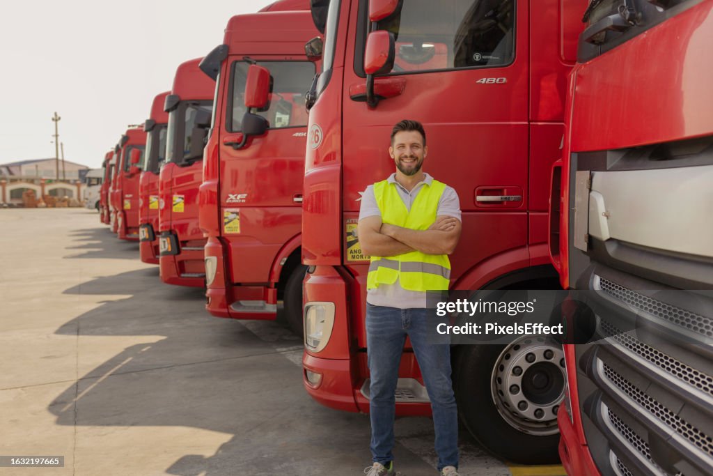 Confident Truck Driver on Parking Lot Looking at Camera