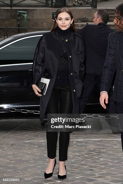 Elisabeth Olsen arrives to attend the 'Louis Vuitton' Fall/Winter 2013 Ready-to-Wear show as part of Paris Fashion Week on March 6, 2013 in Paris,...