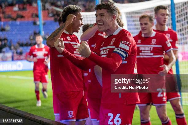 Middlesbrough players celebrate during the Carabao Cup 2nd Round match between Bolton Wanderers and Middlesbrough at the Toughsheet Stadium, Bolton...