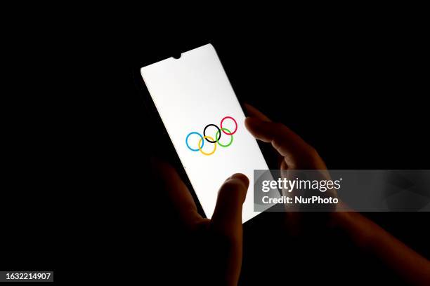 In this photo illustration a Olympic Rings Symbol seen displayed on a smartphone screen in Chania, Greece on August 29, 2023.