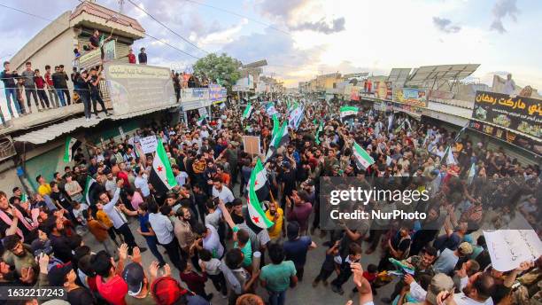 Protests in the city of Jandairis in northwestern Syria in support of the revolutionary movement against the Assad regime in the provinces of Sweida...