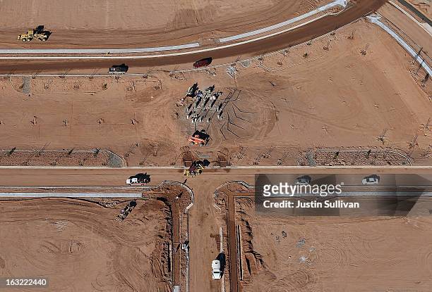 Empty parcels of land are seen at a new housing development on March 6, 2013 in Mesa, Arizona. In 2008, Phoenix, Arizona was at the forefront of the...