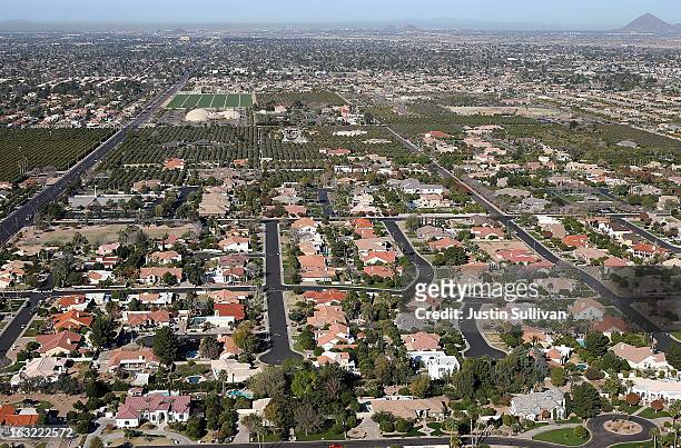 Rows of homes are seen on March 6, 2013 in Mesa, Arizona. In 2008, Phoenix, Arizona was at the forefront of the U.S. Housing crisis with home prices...