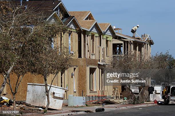 New homes are under construction at a housing development on March 6, 2013 in Gilbert, Arizona. In 2008, Phoenix, Arizona was at the forefront of the...