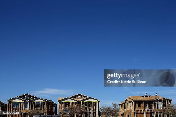 New homes are under construction at a housing development on March 6, 2013 in Gilbert, Arizona. In 2008, Phoenix, Arizona was at the forefront of the...