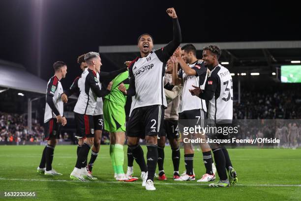 Kenny Tete of Fulham celebrates after scoring the winning penalty during the Carabao Cup Second Round match between Fulham and Tottenham Hotspur at...