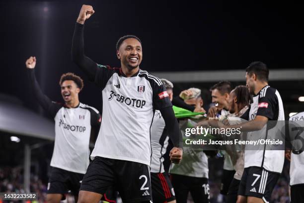 Kenny Tete of Fulham celebrates after scoring the winning penalty during the Carabao Cup Second Round match between Fulham and Tottenham Hotspur at...