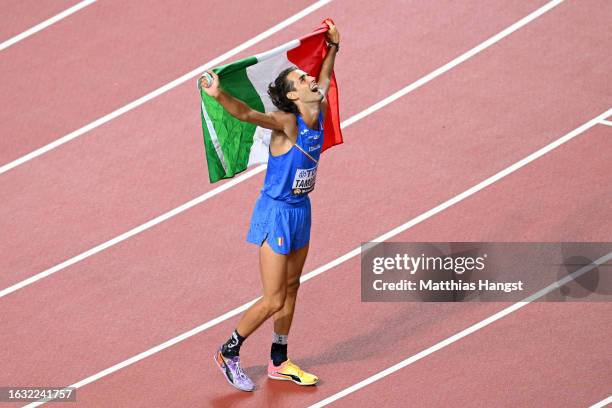 Gold medalist Gianmarco Tamberi of Team Italy celebrates after winning the Men's High Jump Final during day four of the World Athletics Championships...