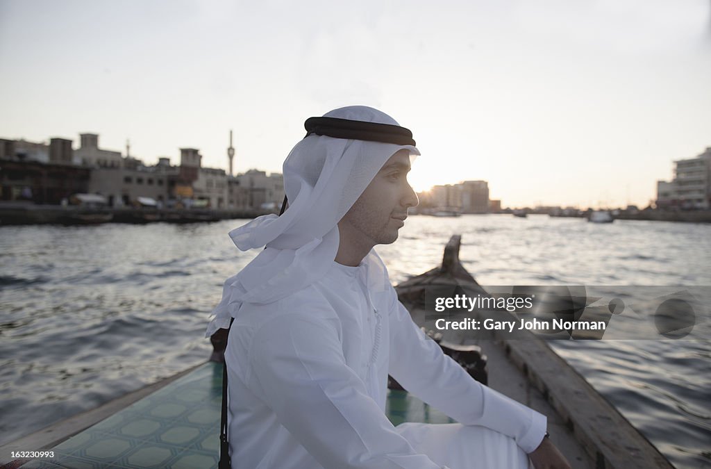 Arab businessman in traditional dress, Dubai Creek