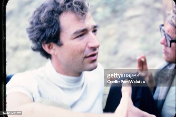 At the Esalen Institute, psychologist Edward Maupin and Resident Fellow Steve Stroud talk together, Big Sur, California, 1967. The institute was...