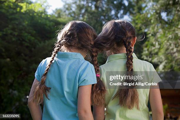 twins in garden - twin girls bildbanksfoton och bilder