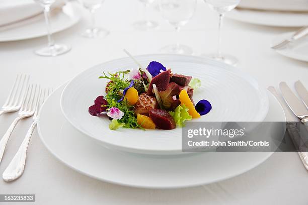 salad with duck breast garnished with flowers - serving dish stock pictures, royalty-free photos & images