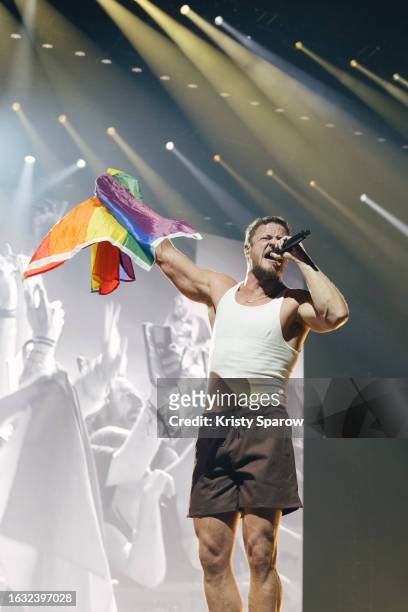 Dan Reynolds of Imagine Dragons performs onstage at Paris La Defense Arena on August 22, 2023 in Nanterre, France.